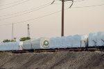 QTTX & KRL Flat cars with load in the yard